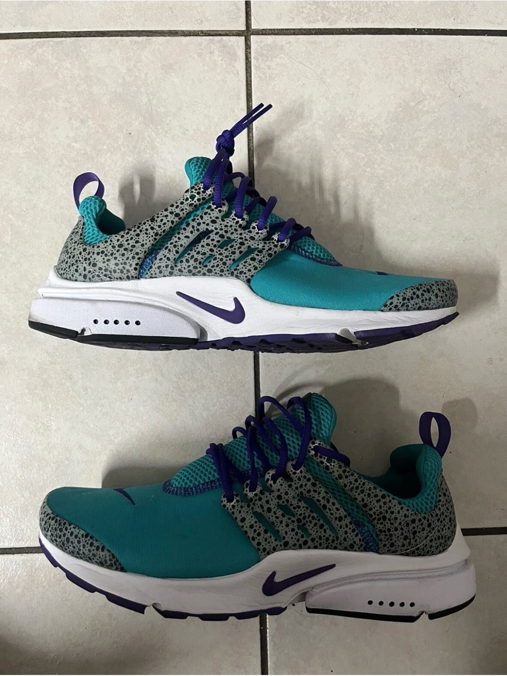 Nike teal and purple running shoes